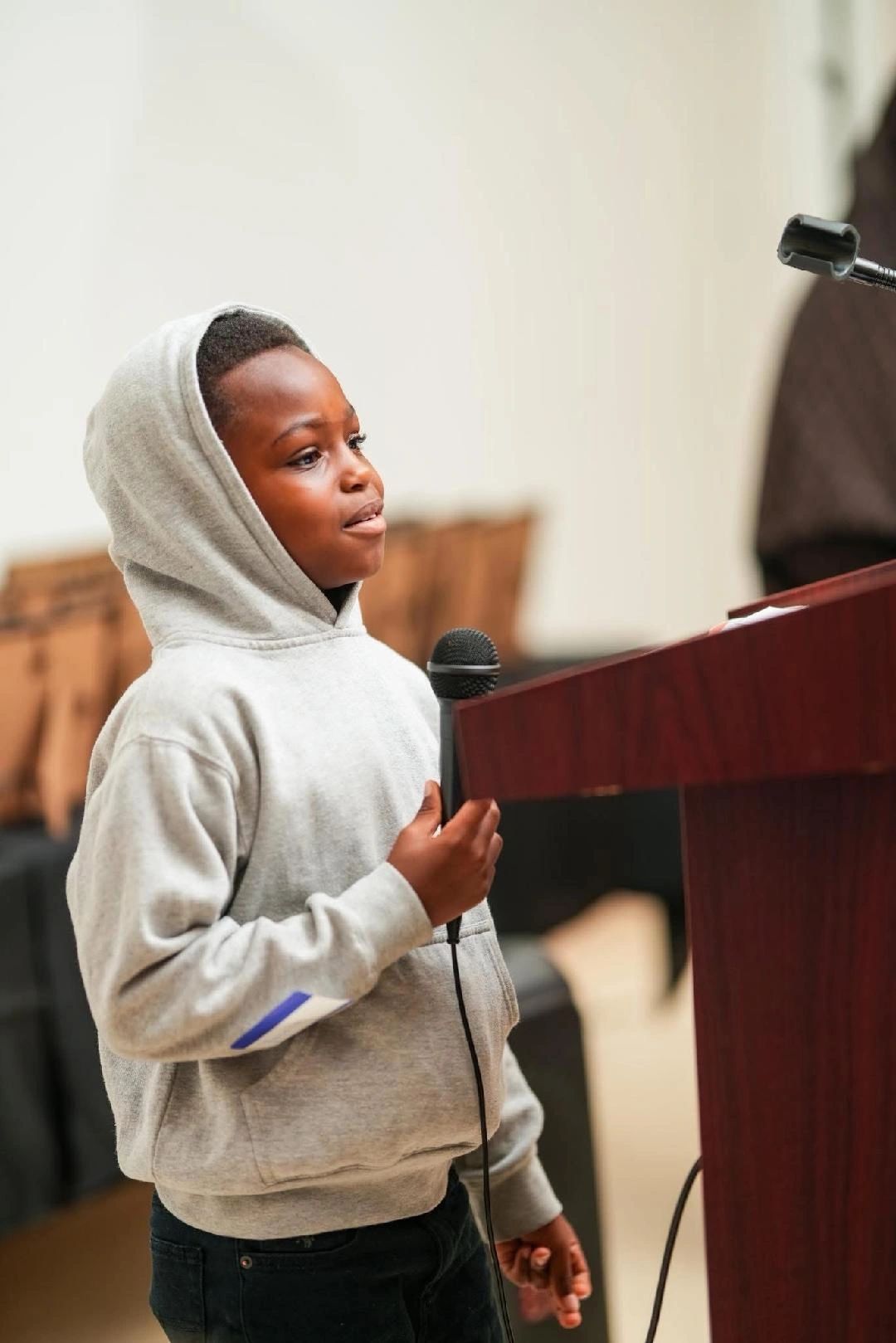 More Than A Smile Foundation founder speaking at a community event
